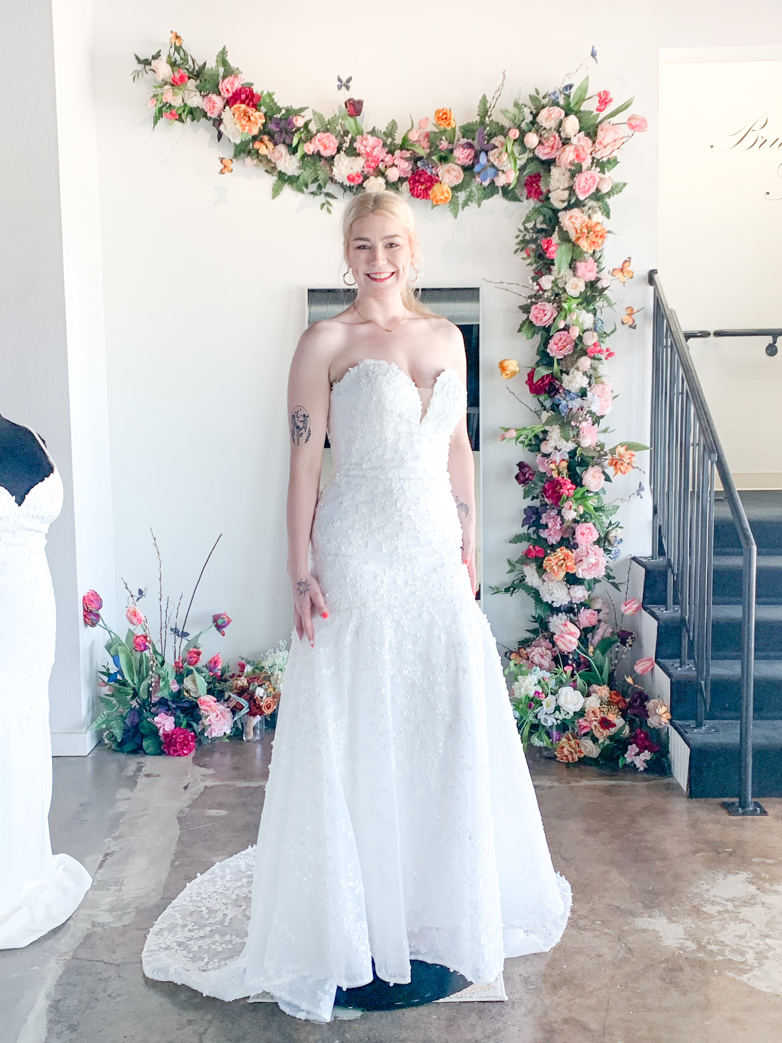 Model wearing a Haley Mai Bridal wedding dress at Bliss Bridal Salon in Fort Worth.