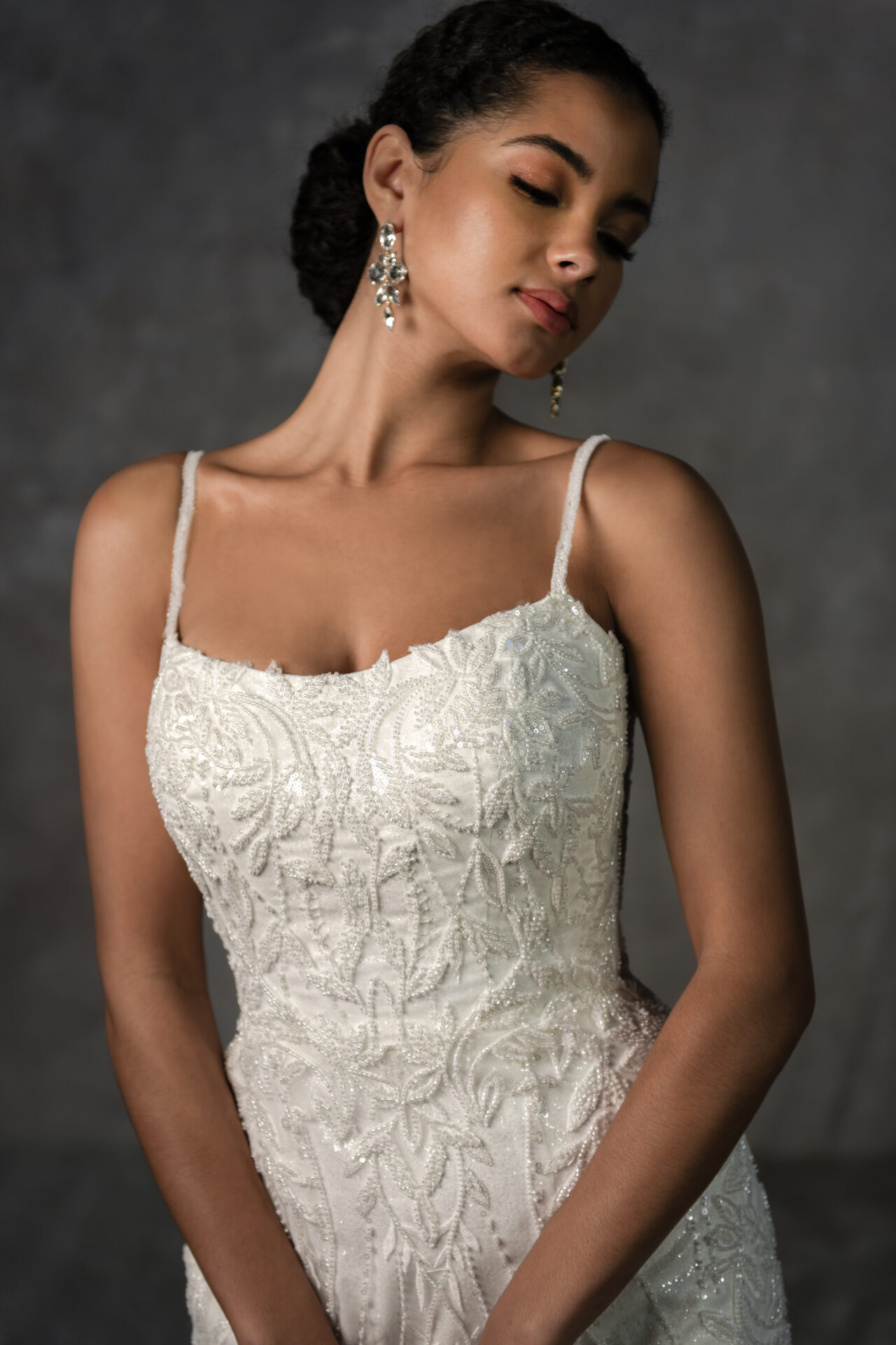 Essense of Australia wedding dress Style D4279 with 3D vine lace, beaded straps, and a sheer lace train