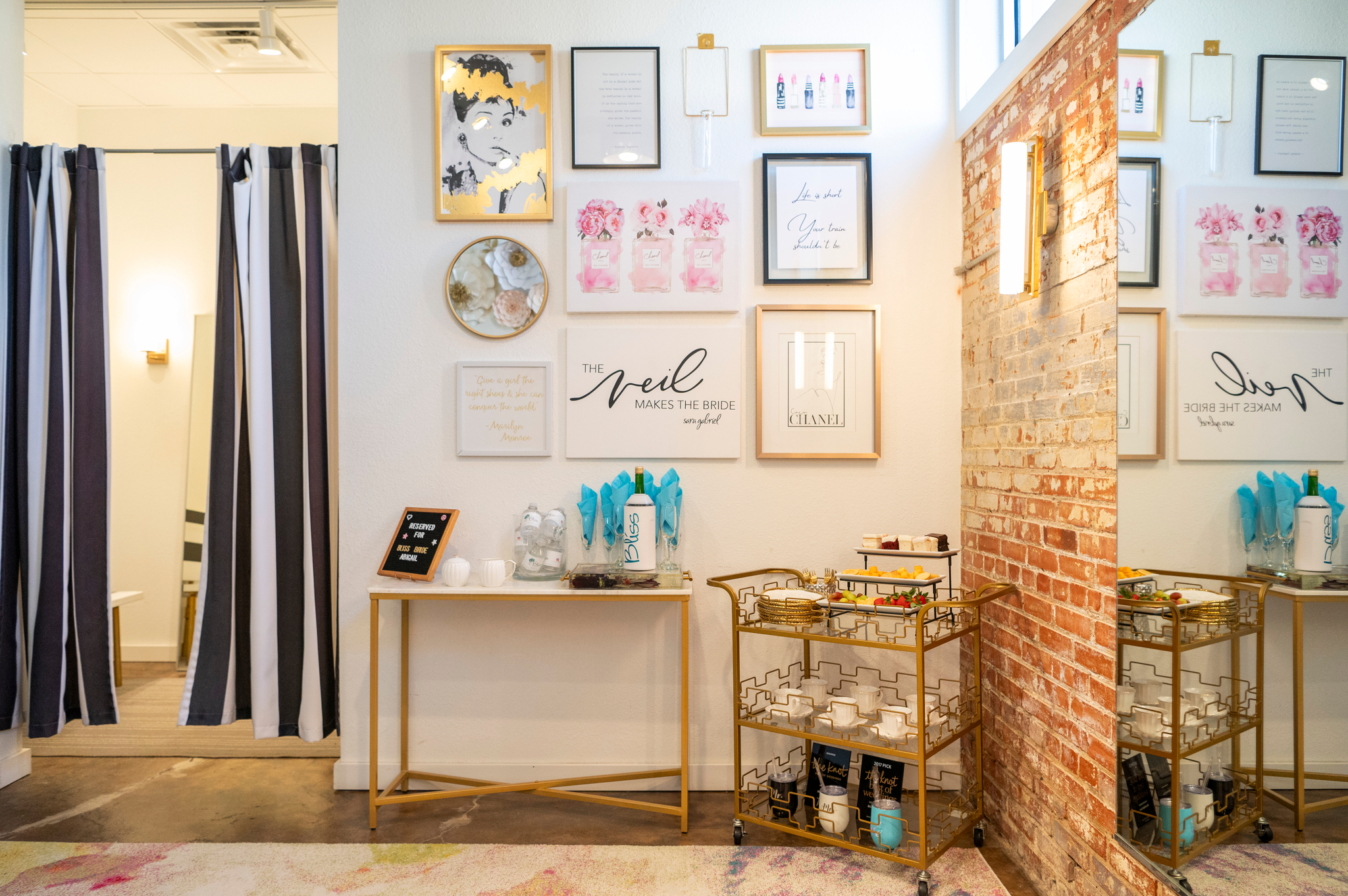 At Bliss Bridal Salon, our Luxe Appointments are designed to transform gown shopping into a once-in-a-lifetime experience. This exclusive suite, beautifully captured by Courtney Lynn Photography, features a spacious private fitting area, plush seating for your guests, and delightful touches like celebratory champagne and hand-picked sweet treats. Whether you're saying “Yes!” or savoring the moment with loved ones, the Luxe Suite sets the perfect backdrop for memories that last forever.