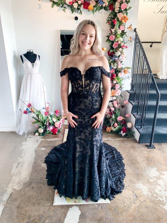 Model wearing a black wedding dress from the Bliss Noir Collection at Bliss Bridal Salon in Fort Worth.