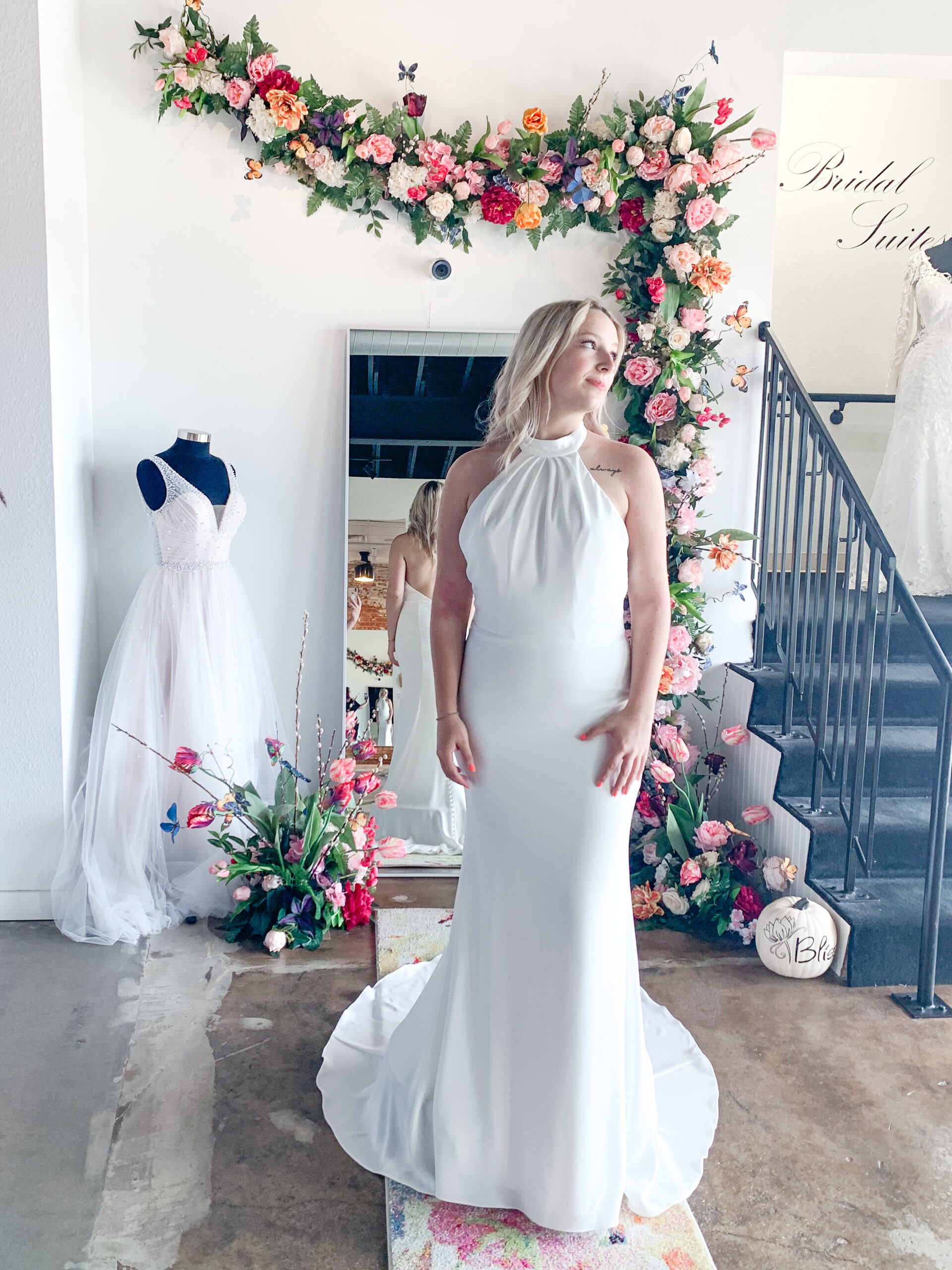 Model wearing a Haley Mai Bridal wedding dress at Bliss Bridal Salon in Fort Worth.