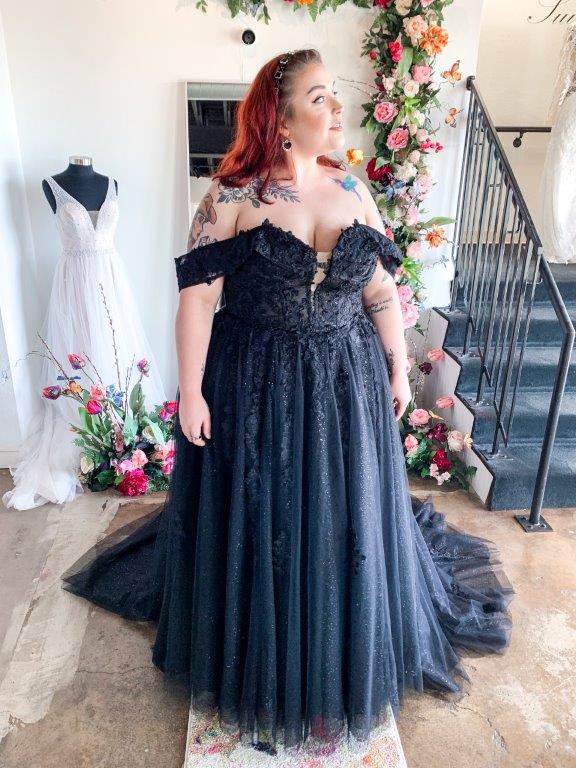 Model wearing a black wedding dress from the Bliss Noir Collection at Bliss Bridal Salon in Fort Worth.